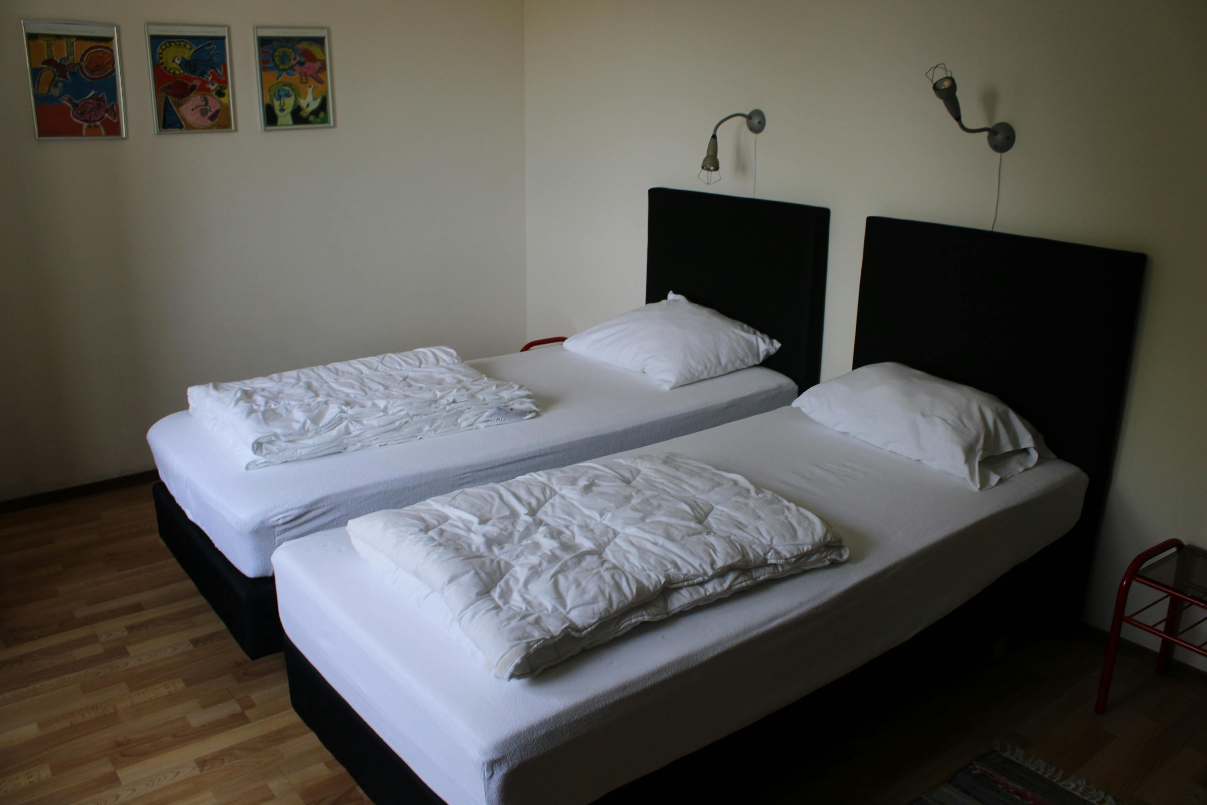 Slaapkamer één met twee 1-persoonsbedden